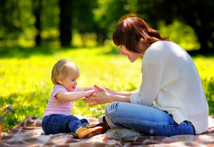 Glowing health-body connection is what we expect epitomised by this mother and her baby in the park